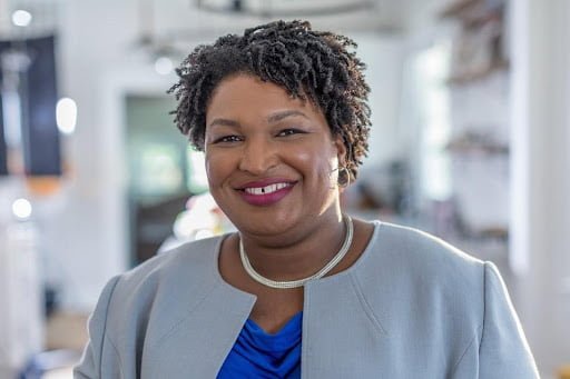 Stacy Abrams smiling.